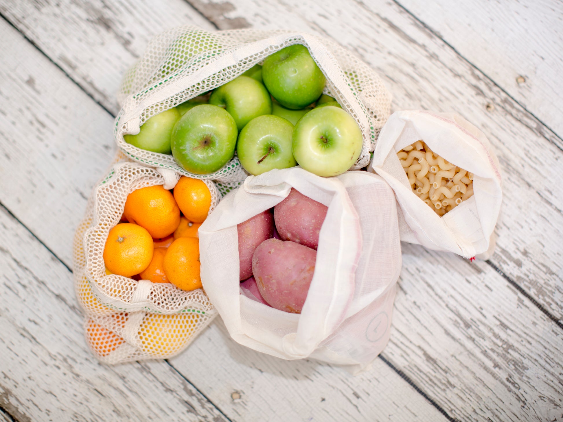 Reusable produce bags by My Eco Vita. They come in a pack of 4 with 2 options of large and small bags. These produce bags are organic, compostable and the best eco friendly option to avoid single use plastic bags